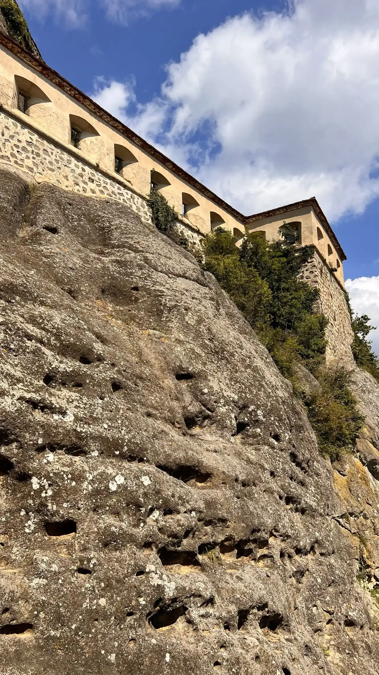 Curtain wall and bastion, built on tuff