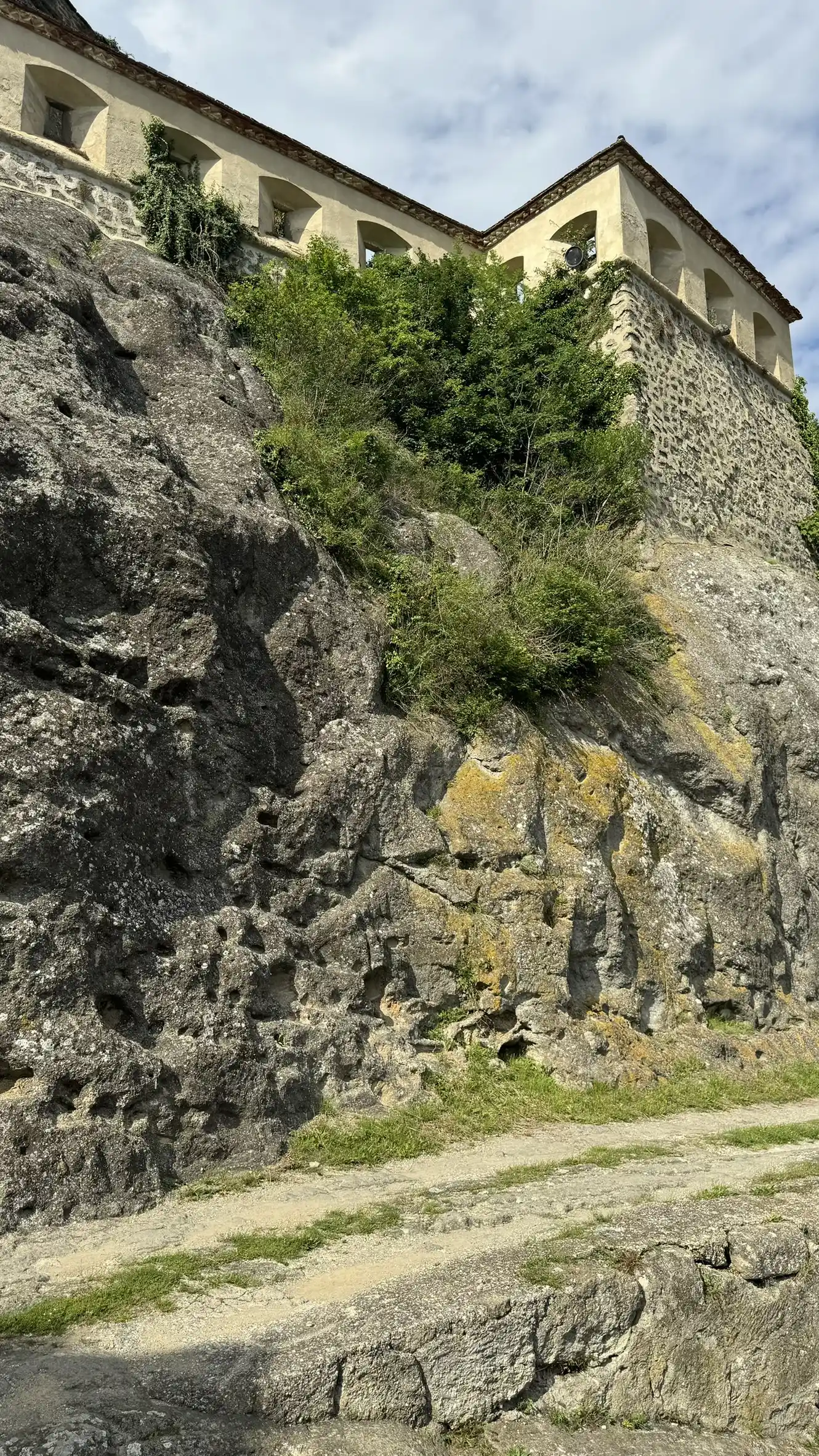 Curtain wall and bastion, built on tuff
